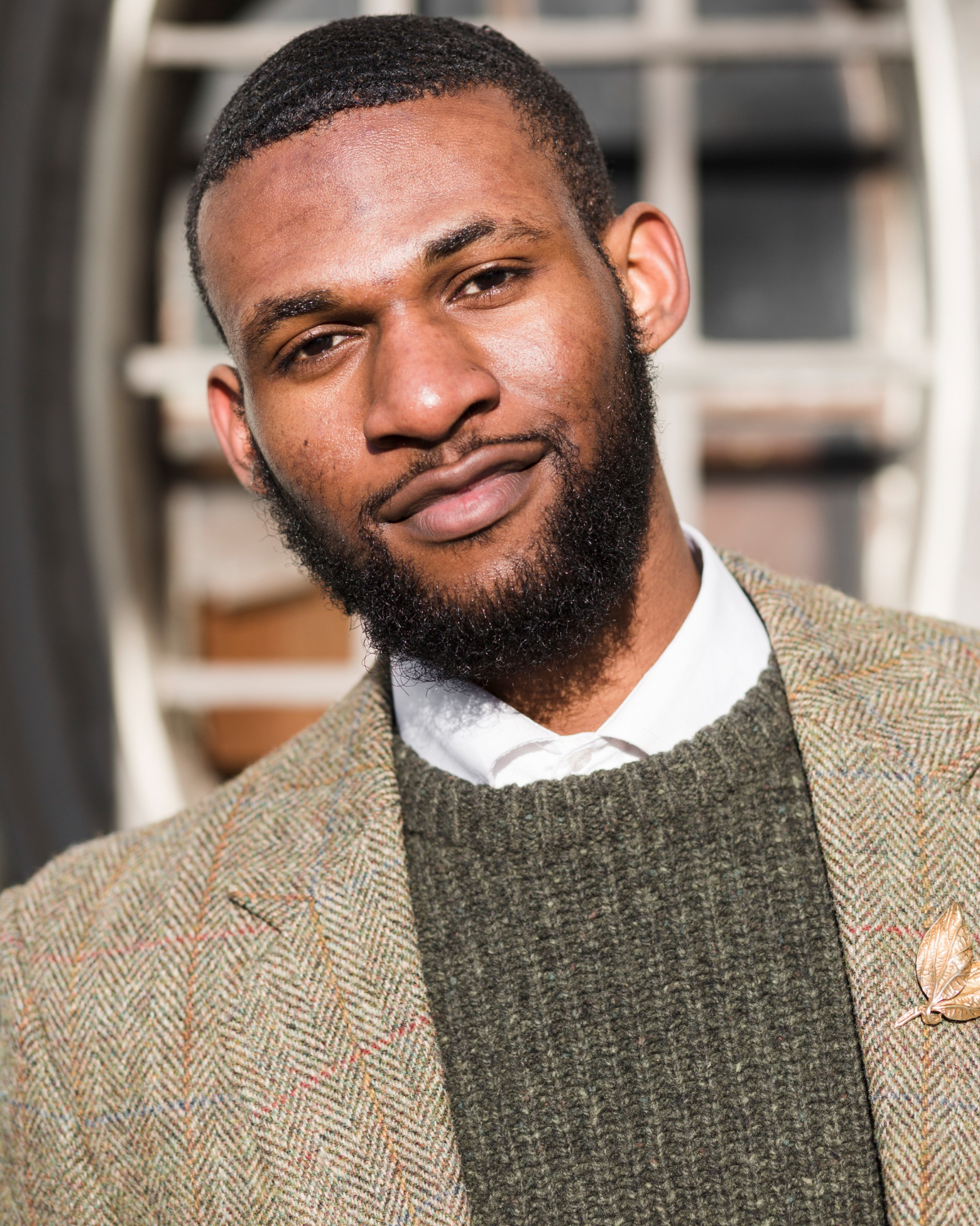Portrait of a man in a tweed jacket
